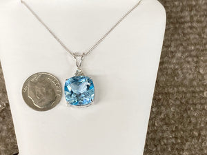 Blue Topaz And Diamond White Gold Pendant