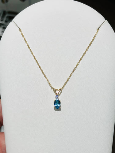 Blue Topaz And Diamond Necklace