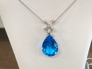 Blue Topaz And Diamond White Gold Pendant