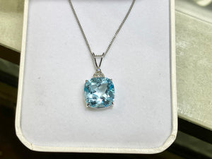 Blue Topaz And Diamond White Gold Pendant